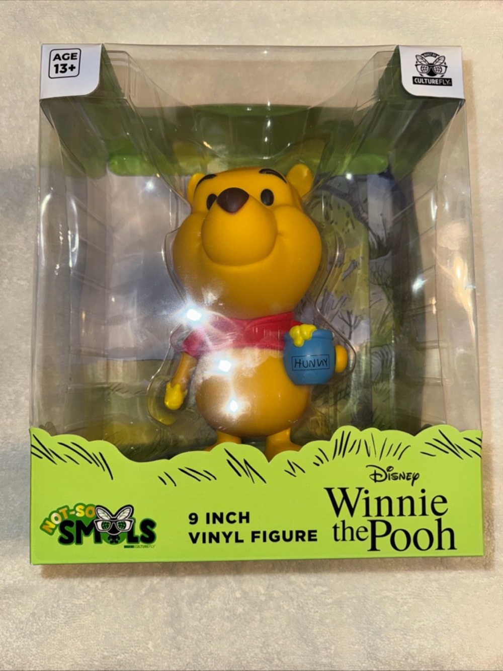 Disney Winnie the Pooh Yellow Vinyl Figure with Red Shirt and Blue Hunny Pot